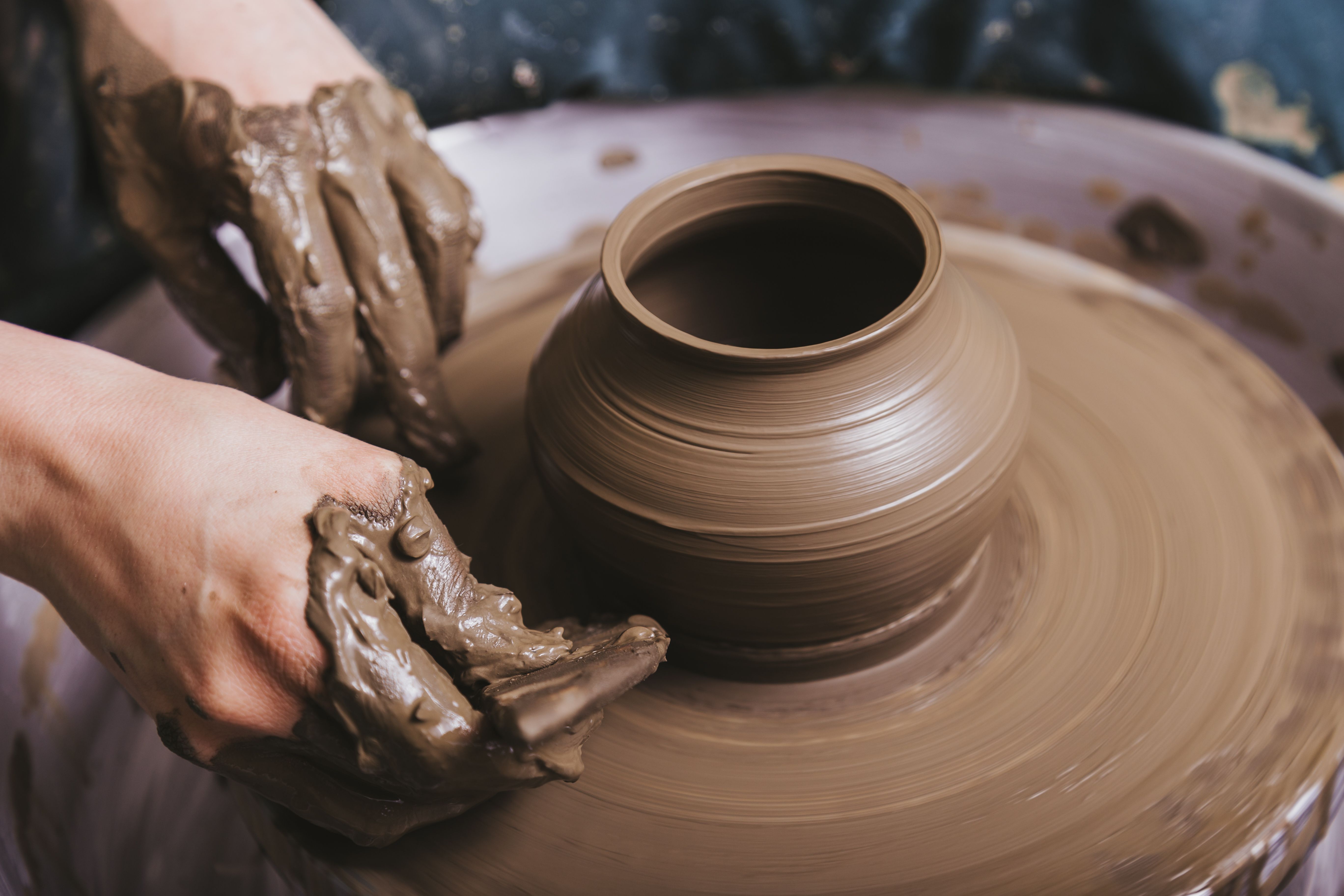 hands-working-pottery-wheel.jpg